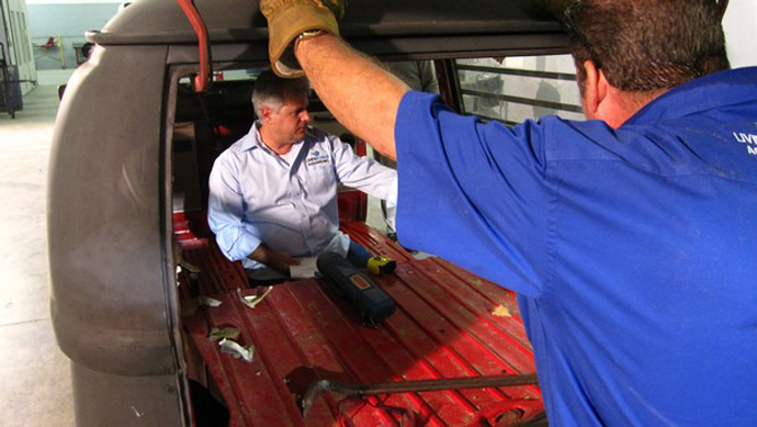 Van side panel was removed and hinges put in the roof to allow the acrylic 800 gallon fishtank to slide in.