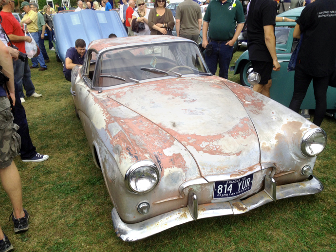 Aluminium body sits atop a wood/steel frame chassis.