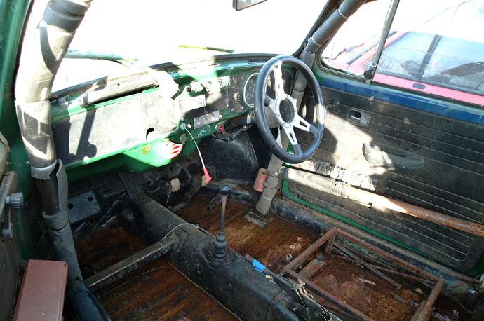 Inside's rusty, although you can still see the full roll cage and custom built seat frames.