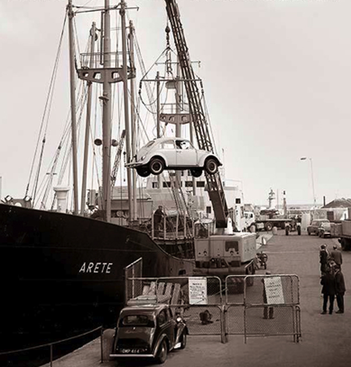 VW commissioned William to photograph Beetles being unloaded in Kent.